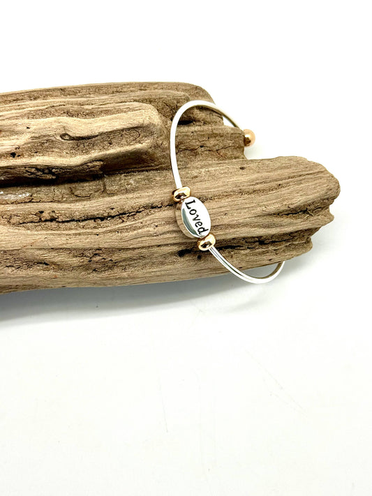 Silver Cuff w/gold tips, Love medallion, anti-tarnish finish