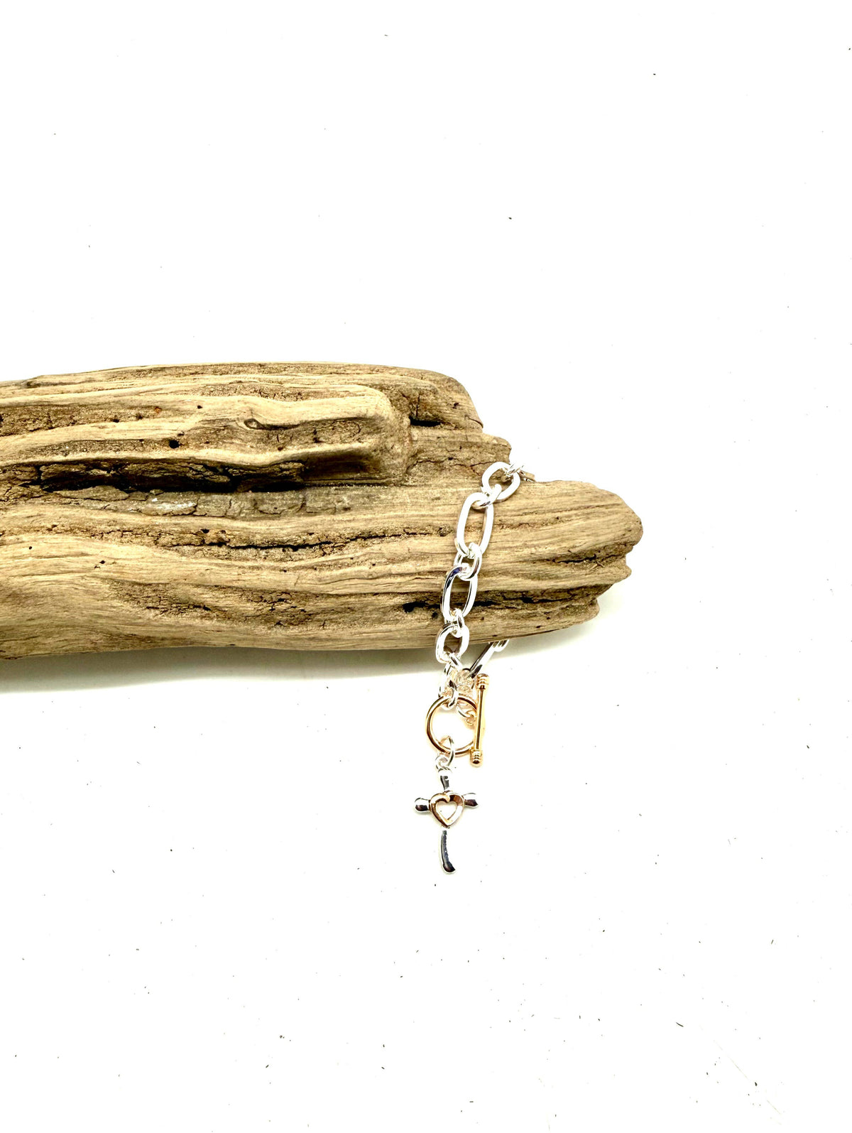 Bracelet Alloy Plated  Sil. Chain w/Multi Metal Cross/Toggle
