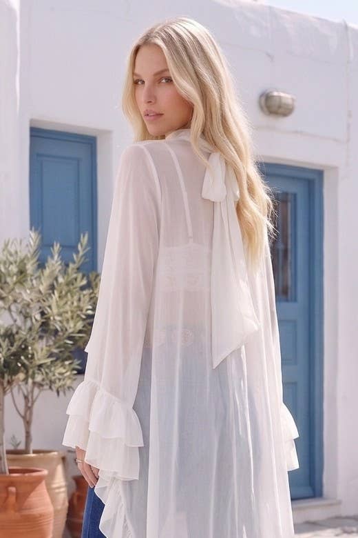 RUFFLED BLOUSE WITH MOCK NECK AND LONG ASYMMETRICAL SIDES