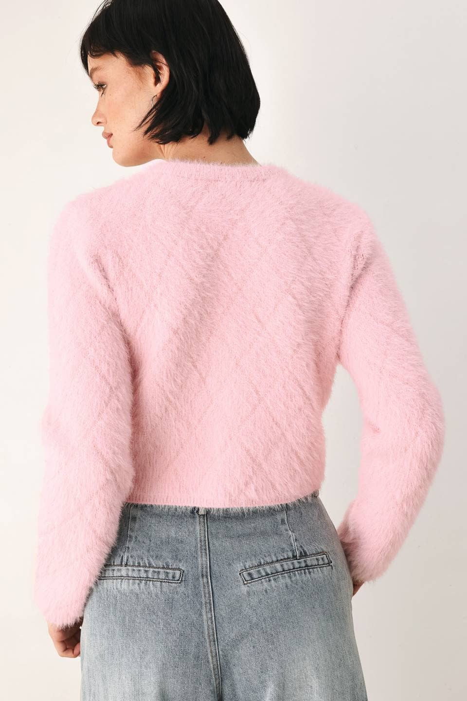 A solid sweater knit cropped cardigan